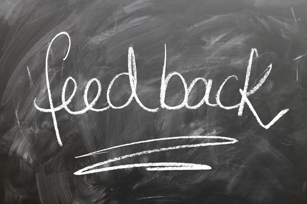 the word feedback, written in chalk